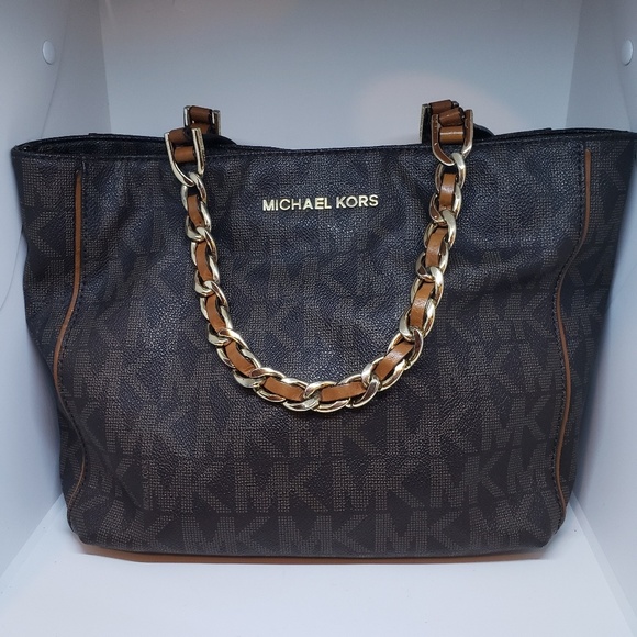 Michael Kors Handbags - Michael Kors purse/metal/leather/handle brown